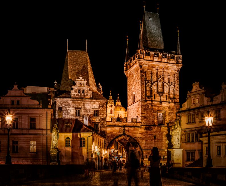 Gothic building lit up at night in Prague Old Town